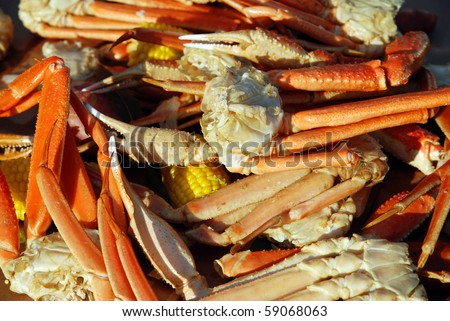 Crayfish and opilio crab legs with hearty vegetables medley served at dusk with shallow DOF