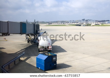 Jet fuel tanker waiting to fuel a commercial airline when it arrives at the jetway