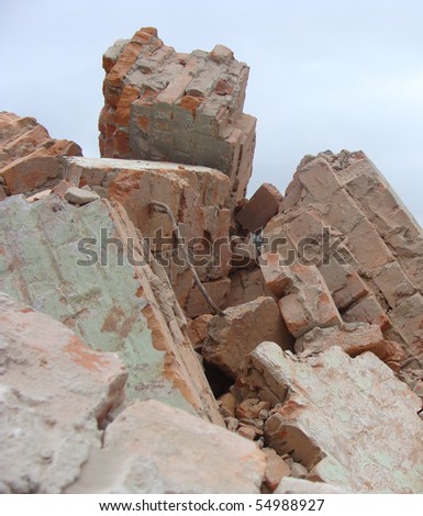 factory demolition stone metal stack of rubble