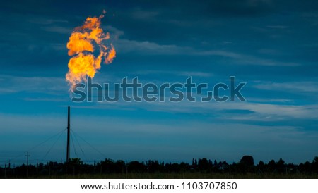 Similar – Image, Stock Photo Gas flaring at oil refinery in evening