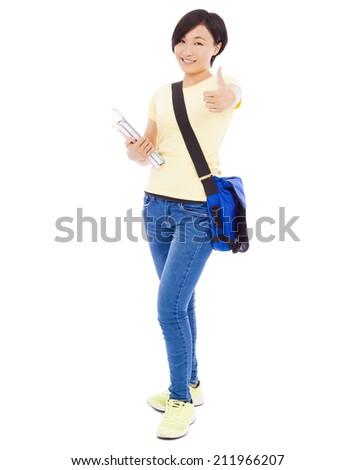 pretty asian college student holding book over white background