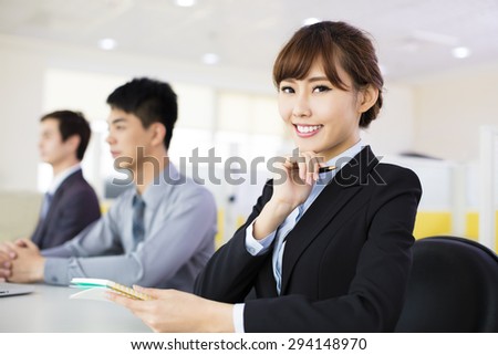 business woman with her staff in conference room