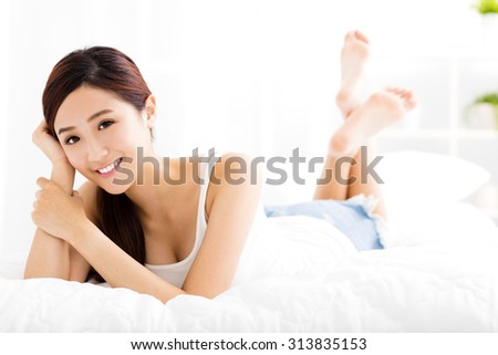 beautiful young asian woman  on the bed