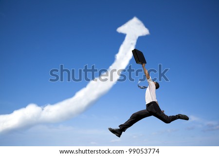 jumping businessman with business growing graph  cloud