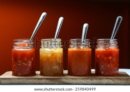 Mexican food dips and sauces in bottles\
Photo of different Mexican food dips and sauces in bottles