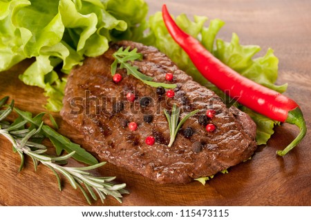 Beef steak grilled on the board