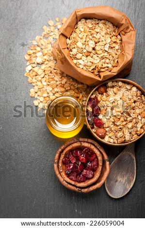 Breakfast with muesli and honey. Fitness Diet and Healthy Eating