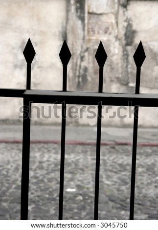 Black iron fence posts