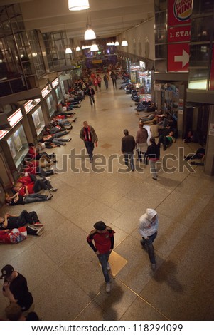 MUNICH, GERMANY - MAY 20: FC Bayern Muenchen supporters sleep at Munic train station after UEFA Champions League Final between FC Bayern Muenchen and Chelsea FC on May 20, 2012 in Munich, Germany