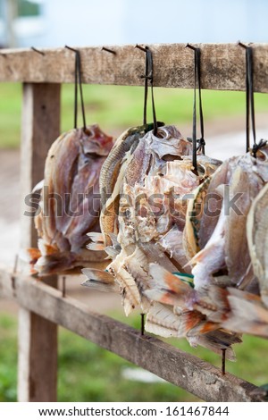 Dried fish hanging outside a restaurant in Morotai Island, Indonesia.