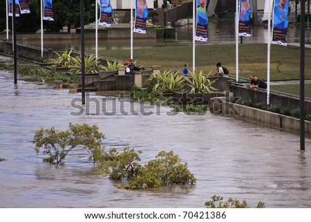 BRISBANE, QUEENSLAND/AUSTRALIA - JANUARY 13: Flooded river bank on January 13, 2011 in South Bank, Brisbane, Queensland, Australia.
