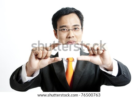 Portrait business man holding blank note card