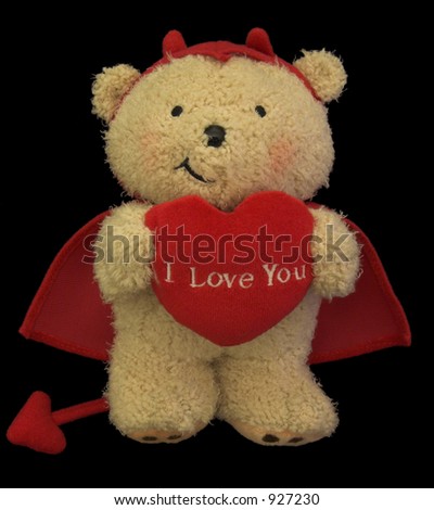 teddy in devil costume with \'I Love You\' heart on black background