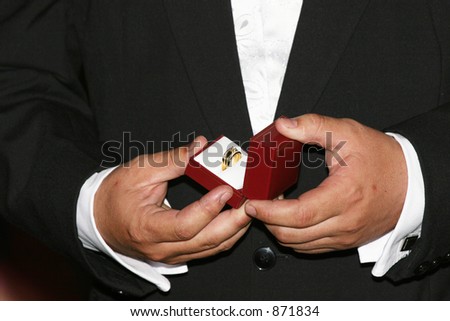 Wedding ring being taken out of box