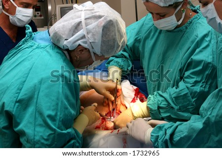 Doctors operating on patient