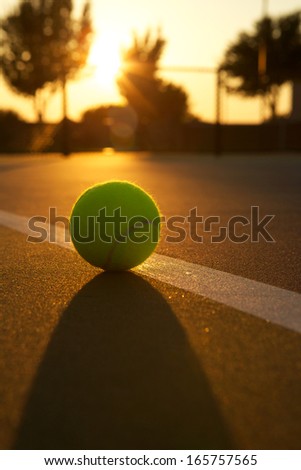 Tennis Ball Backlit at Sunset for Effect and Glow