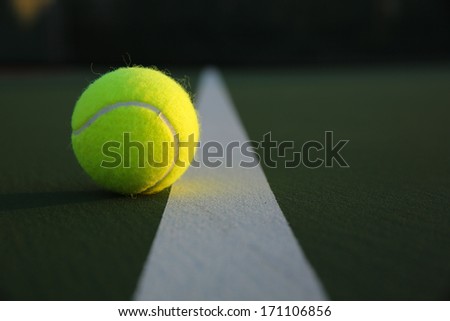 Tennis Ball near the Court Line with room for copy