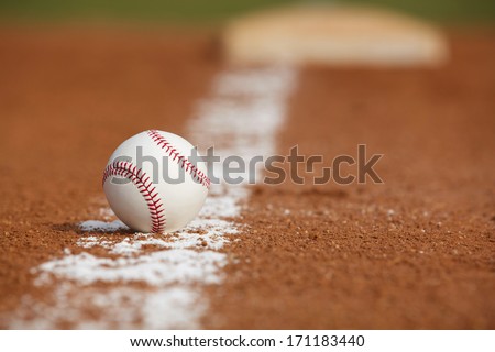 Baseball on the Infield Chalk Line Close up