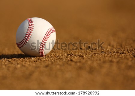New Baseball on the Infield Dirt with room for copy