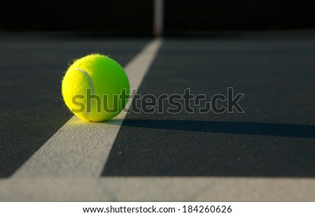 Tennis Ball on the Court Close up with room for copy