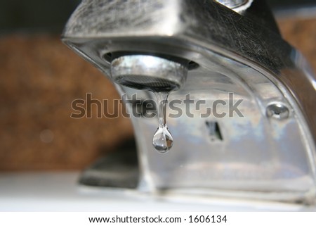 A Drip of water from a faucet