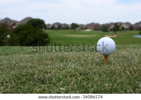 Golf ball teed up