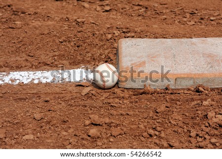 Baseball near first base with room for copy