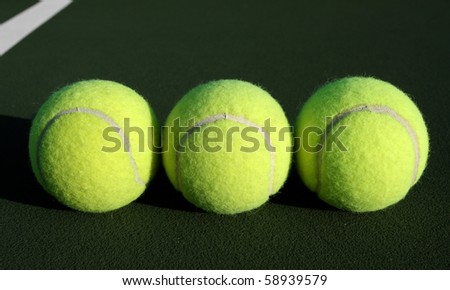 Group of tennis balls on the court