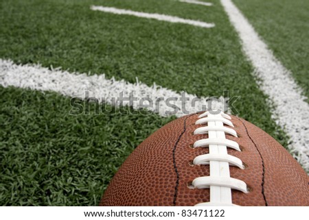 American Football with the yard lines beyond