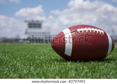 American Football on the Field with the stands in the background