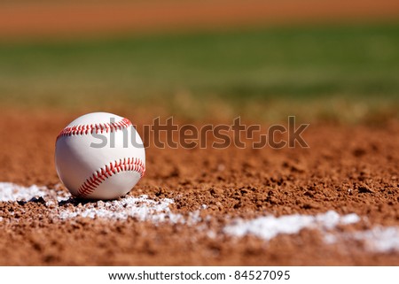 Baseball on the Chalk Line of the Infield