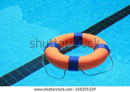 swimming pool with floatable toys in the water