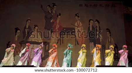 CHENGDU, CHINA - JUNE 3: Chinese Cantonese opera performer make a show on stage to compete for awards in 25th Chinese Drama Plum Blossom Award competition at Jinsha theater on June 3, 2011 in Chengdu, China.