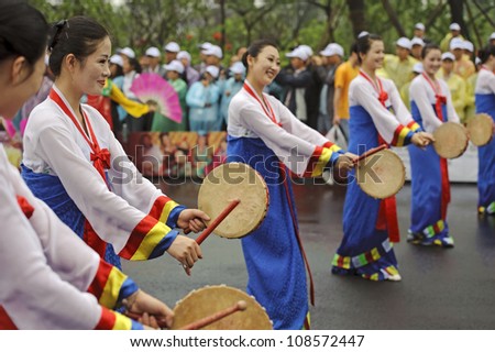 CHENGDU, CHINA - MAY 29: North Korean Pyongyang folk dancers perform in the 3rd International Festival of the Intangible Cultural Heritage.May 29, 20011 in Chengdu, China.