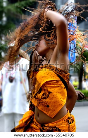 CHENGDU - MAY 23: Madagascan girl perform folk dance in the 1st International Festival of the Intangible Cultural Heritage China, on May 23, 2007 in Chengdu, China.
