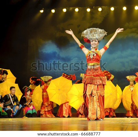 CHENGDU - SEP 26: chinese Yi ethnic dance performed by song and dance troupe of Liangshan Yi autonomous prefecture at JIAOZI theater on Sep 26, 2010 in Chengdu, China.