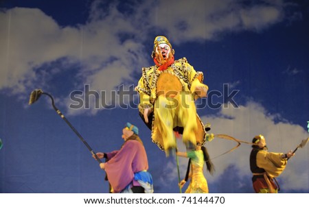CHENGDU - JULY 23: Chinese opera actors perform traditional opera drama onstage at Arts Academy theater of Sichuan Jul 23, 2010 in Chengdu, China.