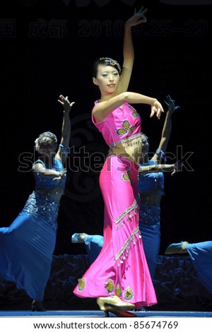 CHENGDU - SEP 28: Chinese Dai ethnic dancer performs on stage in the 6th Sichuan minority nationality culture festival at JINJIANG theater.Sep 28,2010 in Chengdu, China.