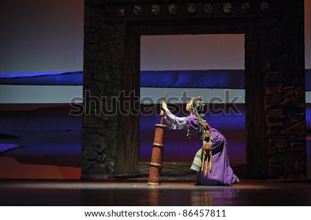 CHENGDU - MAY 25: Chinese Modern Dance Drama Red Army\'s flower perform on stage at Xinan theater on May 25, 2011 in Chengdu, China.