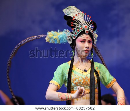 CHENGDU - JULY 23: Chinese opera actress performs traditional drama onstage at Arts Academy theater of Sichuan Jul 23, 2010 in Chengdu, China.