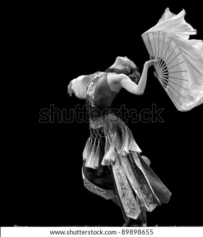CHENGDU - DEC 13: chinese dancer performs modern dance on stage at JINCHENG theate.Dec 13,2007 in Chengdu, China.