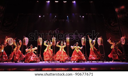 CHENGDU, CHINA - SEPT 28: Korean ethnic dancers perform on stage in the 6th Sichuan minority nationality culture festival at JINJIANG theater, Sept 28, 2010 in Chengdu, China.