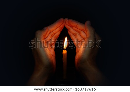 Candle light in hand, Pray concept