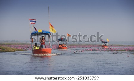 UDONTHANI, THAILAND - JANUARY 31 : Tourist boat travel for see pink lotus lake on January 31, 2015 in Nong Han Udonthani, Thailand