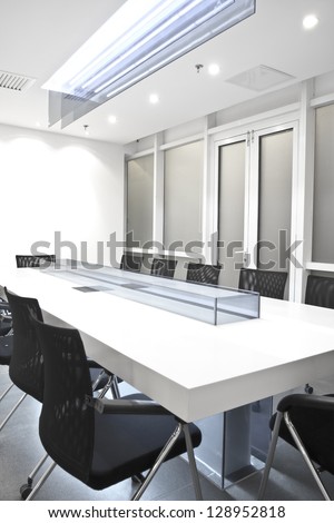 An empty meeting room and conference table