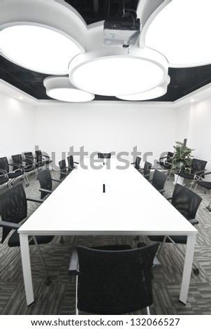 An empty meeting room and conference table