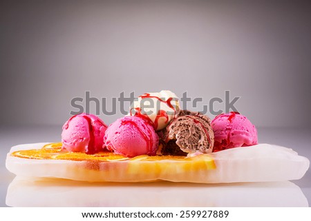 Ice cream on frozen orange slices texture