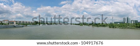 Panoramic view of the Danube River (Donau) from the Empire Bridge, Vienna, Austria. On the right the Danube Island (Donauinsel), famous as a recreational area.