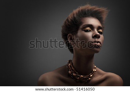 Beauty professional fashion model,studio shot with cool make up.Beautiful African American woman.