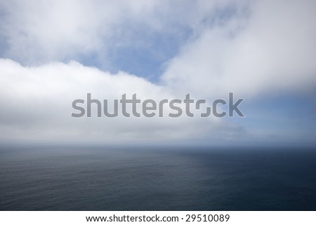Clouds over ocean seascape - landscape orientation